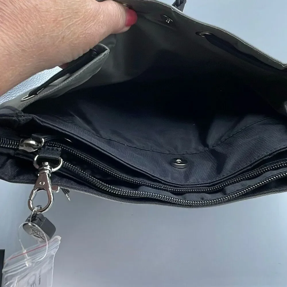 Travelon large crossbody bag. Grey black 12x11x5”.